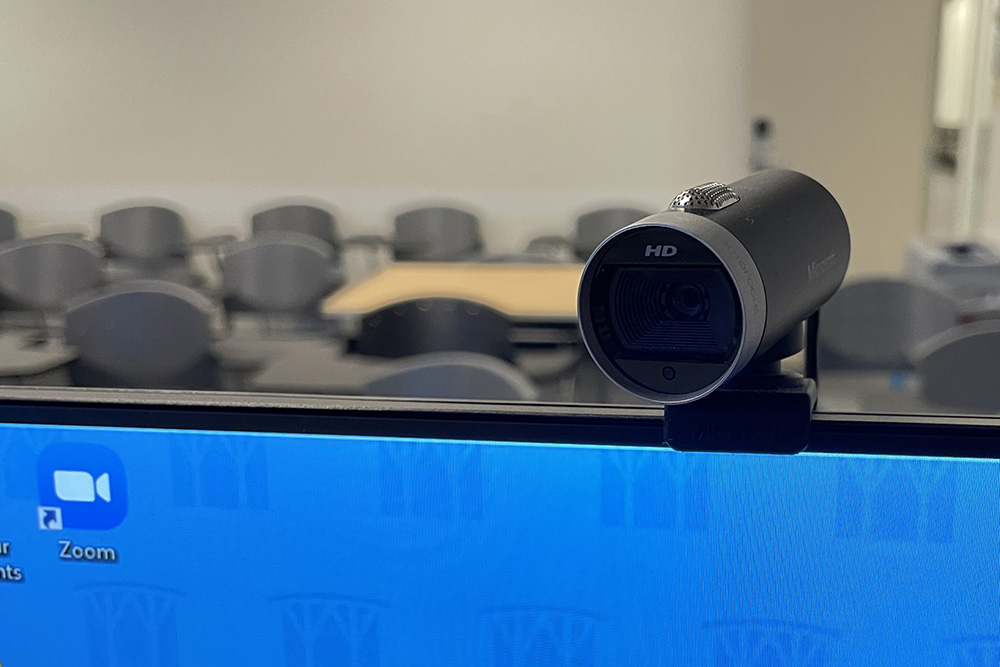Podium webcam mounted on top of a classroom monitor