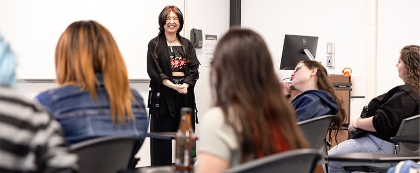 Digital Studies instructor MeeNa Ko addresses the approximately 30 students that took part in Stockton's inaugural Game Jam earlier this month.
