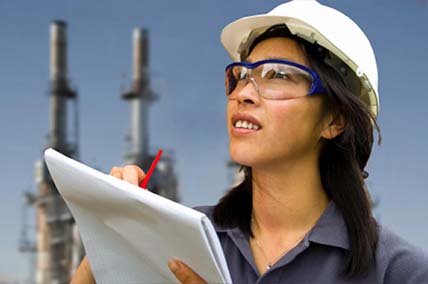 Female energy employee in the field.