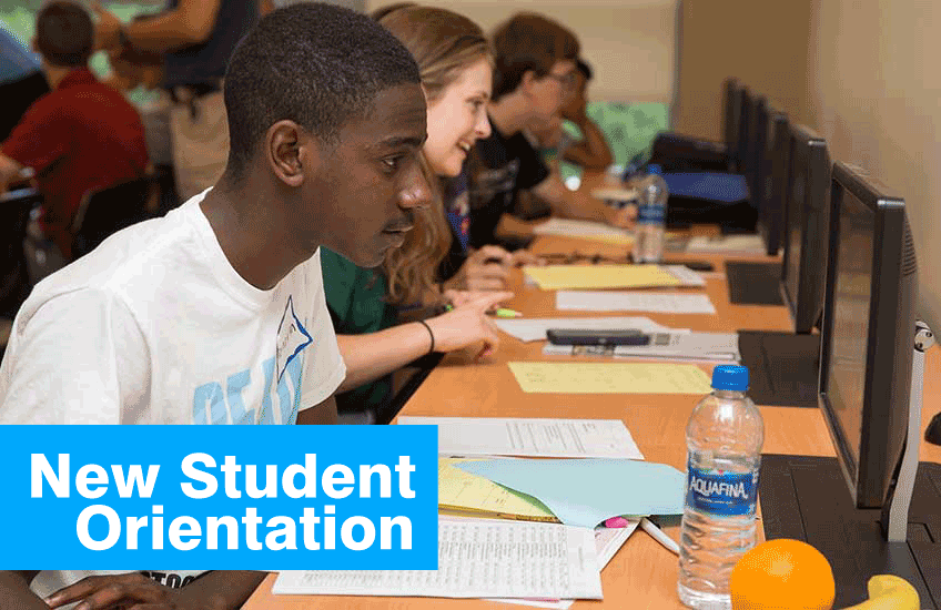 Student at computer registering for classes at orientation
