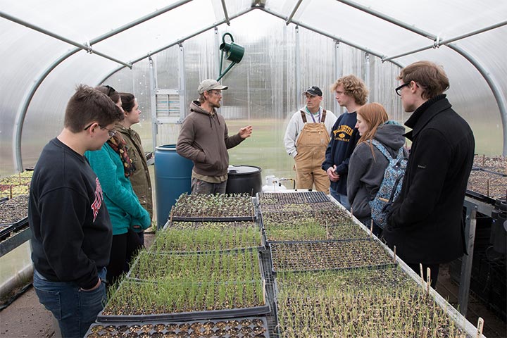 Students learning on the Stockton Farm