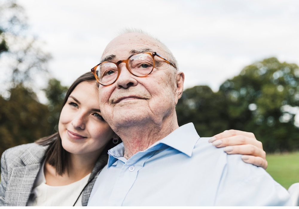 Older person with young woman