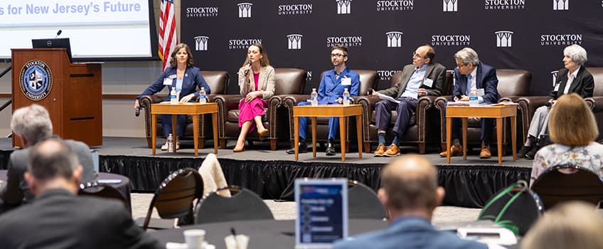 panelists at higher ed conference