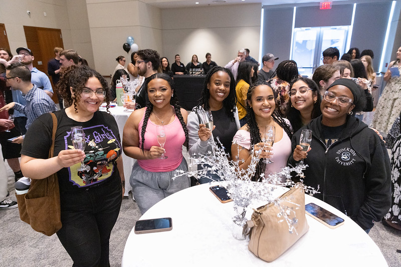 students at grad toast