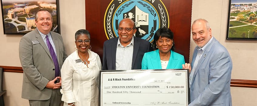 group holding check for scholarship