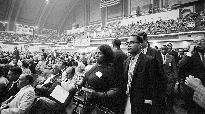 Robert P. Moses and Fannie Lou Hamer observed the crowd at the Democratic National Convention in August 1964.&nbsp;Photo courtesy of George Ballis/ Take Stock.&nbsp;